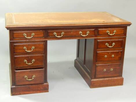 A late Victorian mahogany twin pedestal desk, with three frieze drawers and three to each pedestal, 140cm x 77cm