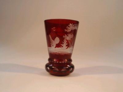 A 19thC Bohemian ruby flash conical vase etched with decoration of a stag in a landscape