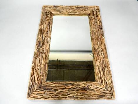 A driftwood framed rectangular wall mirror, 150cm x 100cm