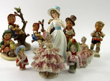 Six Goebel Hummel figures, two Continental half doll figures, two crinoline figures, and further figures, (a quantity).