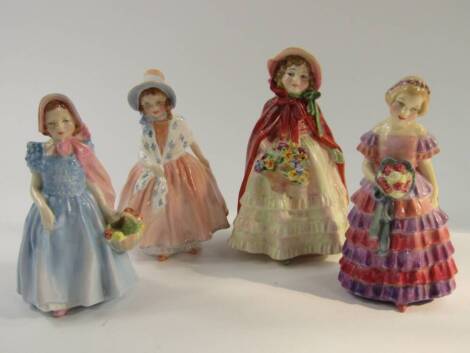 Four Royal Doulton figures, comprising Granny's Shawl HN1647, The Little Bridesmaid (no HN number), Lily HN1798 and Wendy HN2109.