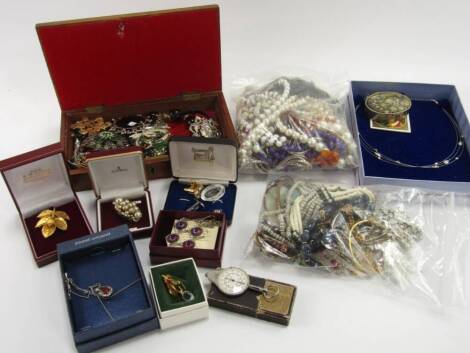 Silver and costume jewellery, including a Swarovski brooch, necklaces, earrings, beads and wristwatches, (a quantity).