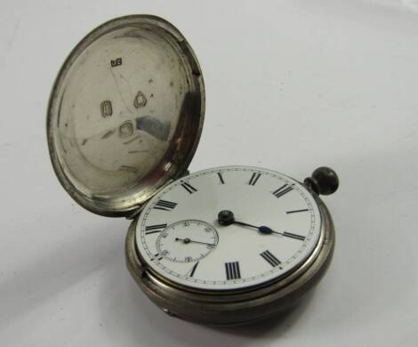 A Victorian lady's silver hunter cased pocket watch, by Pearce of Grantham, enamel dial bearing Roman numerals, subsidiary seconds dial, case with shield reserve, London 1863.