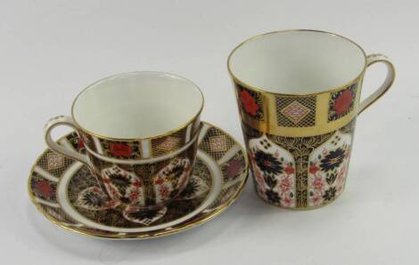 A Royal Crown Derby porcelain Old Imari coffee cup and saucer, circa 1978, together with a coffee mug, circa 1988, printed marks, (3).