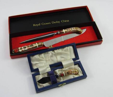 Three Royal Crown Derby porcelain Old Imari handled knives, comprising bread and butter knives, both boxed, and a paper knife.