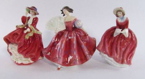 Three Royal Doulton figures, comprising Top o' the Hill HN1834, Denise HN2273 and First Waltz HN2862.