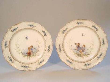 A pair of late 19thC/early 20thC German porcelain plates