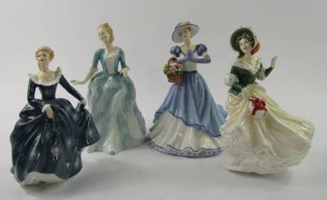 Four Royal Doulton figures, comprising Happy Birthday 2011 HN5428, Yvonne HN3038, Fragrance HN2334, and Christmas Day 2002 HN4422.