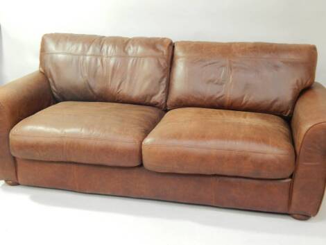 A brown leather sofa, 215cm wide