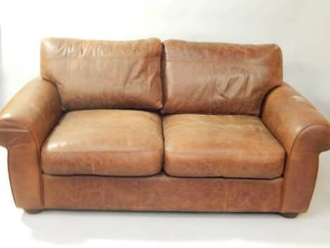 A brown leather sofa, 180cm wide