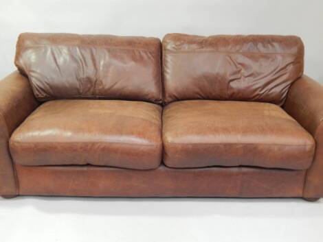 A brown leather sofa, 215cm wide