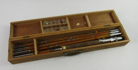 A Hardy Dry Fly six piece split cane rod, DT-7, circa 1950's, boxed with flies.