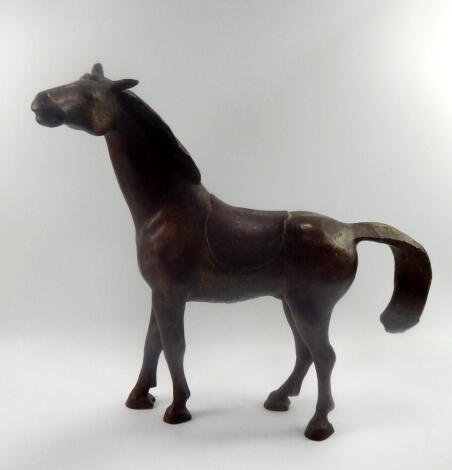 Style of Dame Elizabeth Frink. A 20thC bronze statue of a horse, 60cm high.