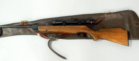 A Webley & Scott Excel air rifle, No 861146 with a 6x40 gun sight, cased.