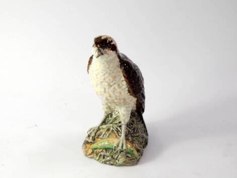 A Beswick pottery whisky bottle modelled as an Osprey, by D Lyltleton for Beneagles, 1977, full, 19.5cm high.