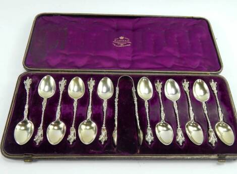 A set of Victorian silver gilt apostle spoons and sugar tongs, W Gibsons & Co, London 1882, 5.38t oz, cased.