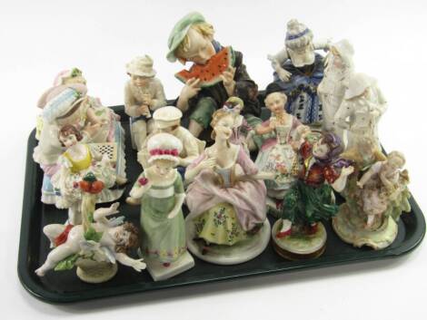 Pottery and porcelain figures, 19thC and later, including a Volkstadt figure of a boy playing a flute and another playing a concertina, Royal Doulton figure of Ruth, Capodimonte type figure of a boy eating a slice of melon and an Unterweissbach figure of 