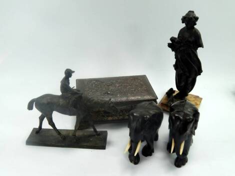 A Chinese antimony box, chased with dragons chasing flaming pearls, 22.5cm x 15cm x 8.5cm, a pair of ebony elephants, a cast metal figure of a racehorse with rider up, and a spelter figure of a girl with flowers raised on a square marble base, (5), (AF).