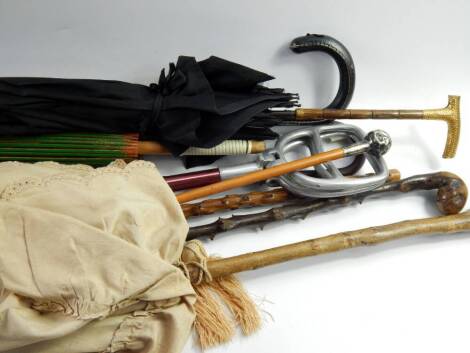 Victorian parasols, walking stick, silver topped swagger stick and shooting sticks, (14).