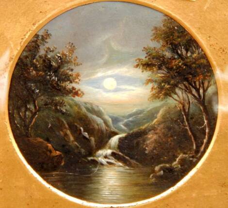 English School (19thC). Cattle watering at sunset, waterfall by moonlight, pair of oils on board, 15cm diameter.