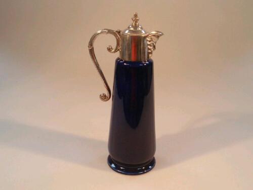 A Wade Falstaff blue glazed claret jug with EP mount having bird head spout