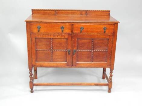 A barleytwist oak sideboard, 108cm wide