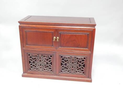 A Chinese hardwood side cabinet, 94cm wide