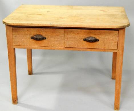 A Victorian stripped pine side table, with two frieze drawers on square taper legs, 99cm wide