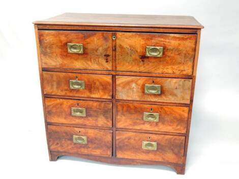 An early 19thC mahogany Campaign secretaire chest, with moulded top, flamed drawers with brass inset handles, with fitted upper interior and an arrangement of six oak lined drawers beneath, 96cm wide, 96cm high, 55cm deep.