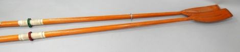 A pair of Sutton racing blades, 300cm long.