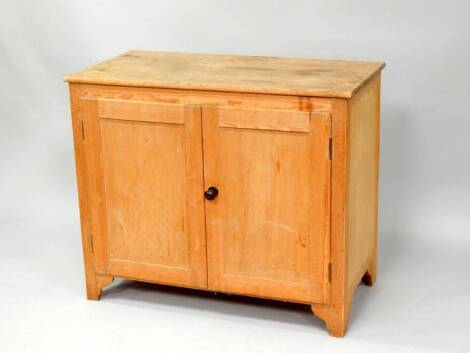 A Victorian stripped pine cupboard, with two doors, 95cm wide