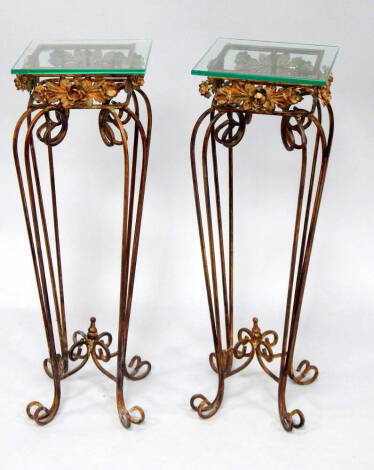 A pair of jardiniere stands, with wrought iron bases, 80cm high