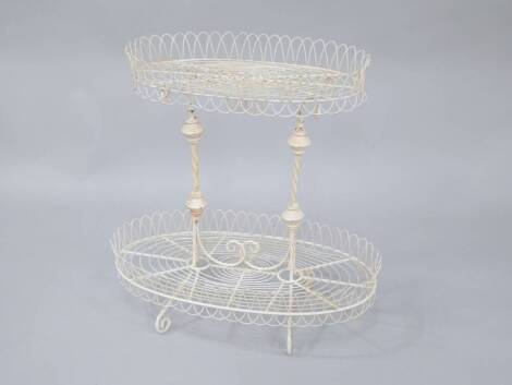 A Regency wire work two tier plant stand, 71cm x 27cm.