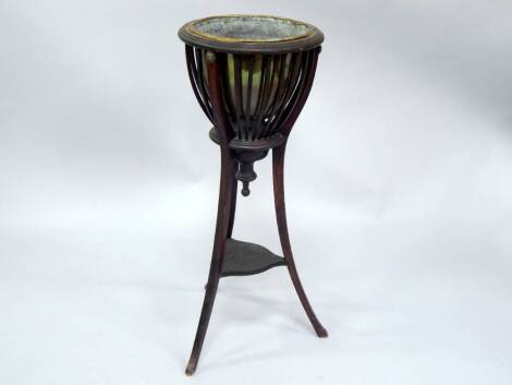 A Victorian mahogany jardiniere stand, with brass liner, 90cm high