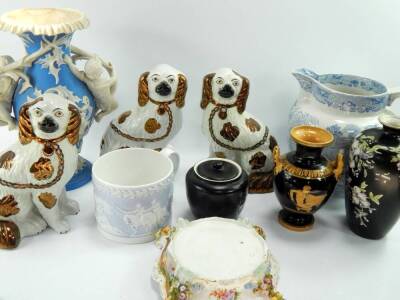 Three Staffordshire pottery spaniels, with copper lustre markings, a parian vase of baluster form decorated with vines and moulded with dogs against a blue ground chinoiserie blue and white jug and sundry ceramics, (10).