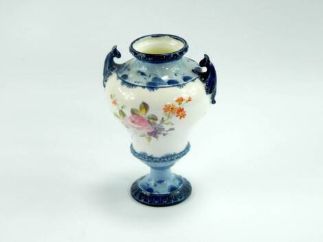 A Royal Crown Derby porcelain vase 1895, of ogee baluster form painted with flowers within blue borders, No 4758/1051, printed mark, 11.5cm high.