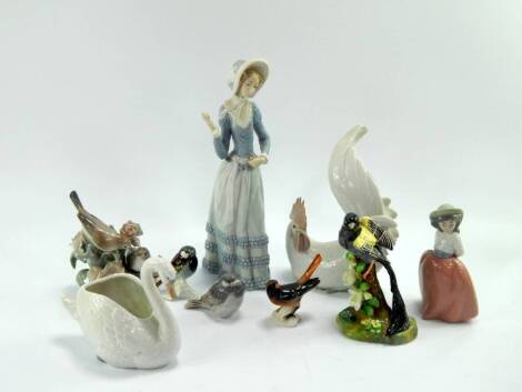 Ceramics, including a Lladro cockerel, Royal Copenhagen sparrow, two Goebbels birds, Nao girl and a Crown Staffordshire figure modelled by J T Jones of a Widowbird, (a quantity).