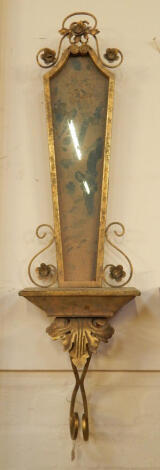 A gilt wall mirror with shelf, 93cm high