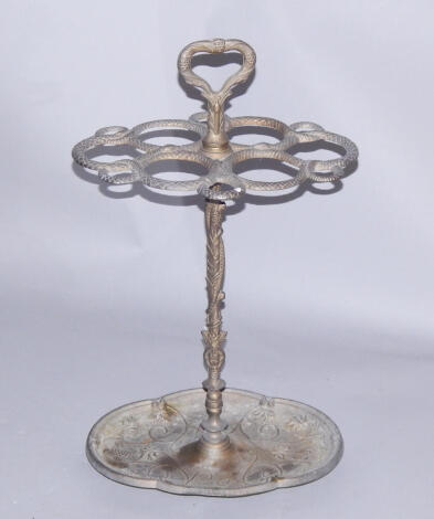 A Victorian style brass stick and umbrella stand, cast to the top with serpents, the base with vines, 66cm high.