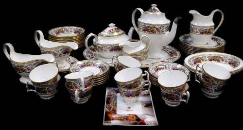 A Spode porcelain part tea dinner and coffee service decorated in the Provence pattern, comprising oval meat platter, a pair of oval dishes, pair of sauce boats on stands, ten dinner plates, dessert bowls, tea and coffee pots, milk and cream jugs, sugar b