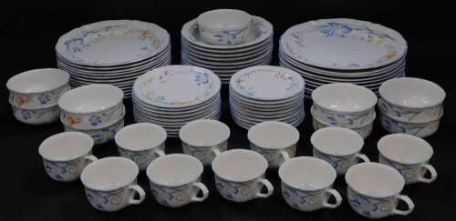 A Villeroy & Boch porcelain dinner and tea service decorated in the Riviera pattern, comprising eleven dinner, twelve dessert and ten side plates, ten soup plates, nine fruit bowls, eleven tea cups and ten saucers.