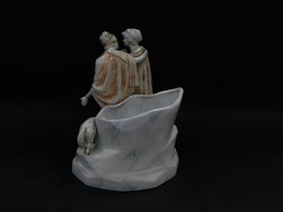 A Continental late 19thC porcelain figural vase, modelled with a shepherd and shepherdess with sheep, on a marbled rocky ground, 28cm high. - 2