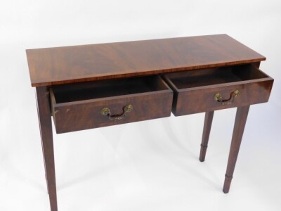 A Georgian style mahogany and cross banded side table, with two frieze drawers, raised on tapering square legs, 76.5cm high, 92cm wide, 31cm deep. - 3