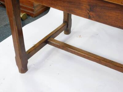 A Gothic style fruit wood and oak refectory style dining table, with a four plank top, and two frieze drawers, raised on canted square legs, united by an H framed stretcher, 75cm high, 207cm wide, 79.5cm deep. - 6