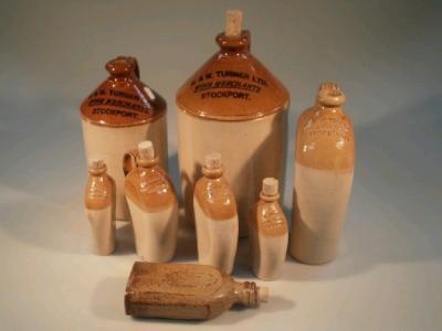 A collection of stoneware flagons and flasks for George and G W Turner