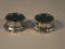 A pair of silver salts with green glass liners. Sheffield assay