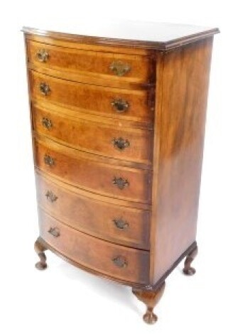 A burr walnut and mahogany cross banded bow front chest, of six long graduated drawers, raised on cabriole legs, 107cm high, 60.5cm wide, 44cm deep.