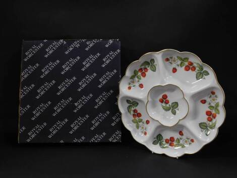 A Royal Worcester porcelain hors d'ouevres dish decorated in the Strawberries pattern, of six division fluted form, printed mark, boxed.
