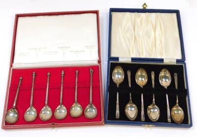 A set of six replica knop and seal top coffee spoons, cased, London 1968, and a further set of six coffee spoons, cased, Sheffield 1967, 4.29oz.