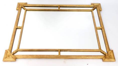 An Adam style gilt wood rectangular wall mirror, 85cm high, 110cm wide.